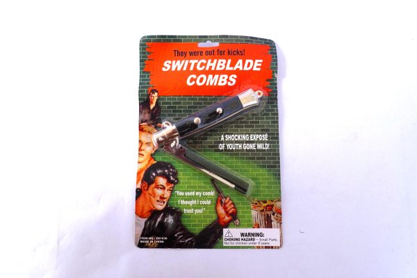 Switchblade comb
